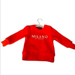 Baby orange Milano sweater.